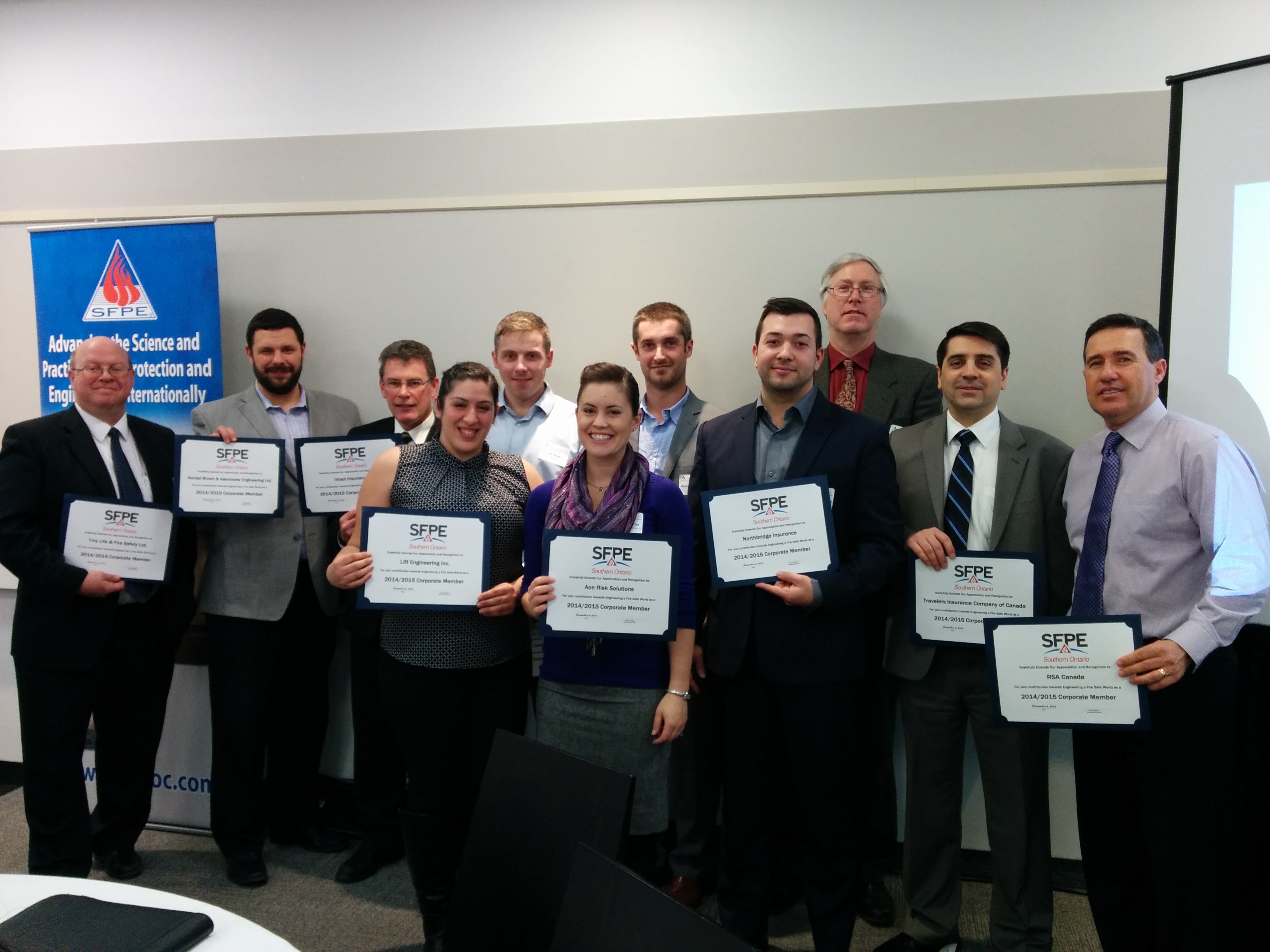 Corporate Members with their certificate of appreciation